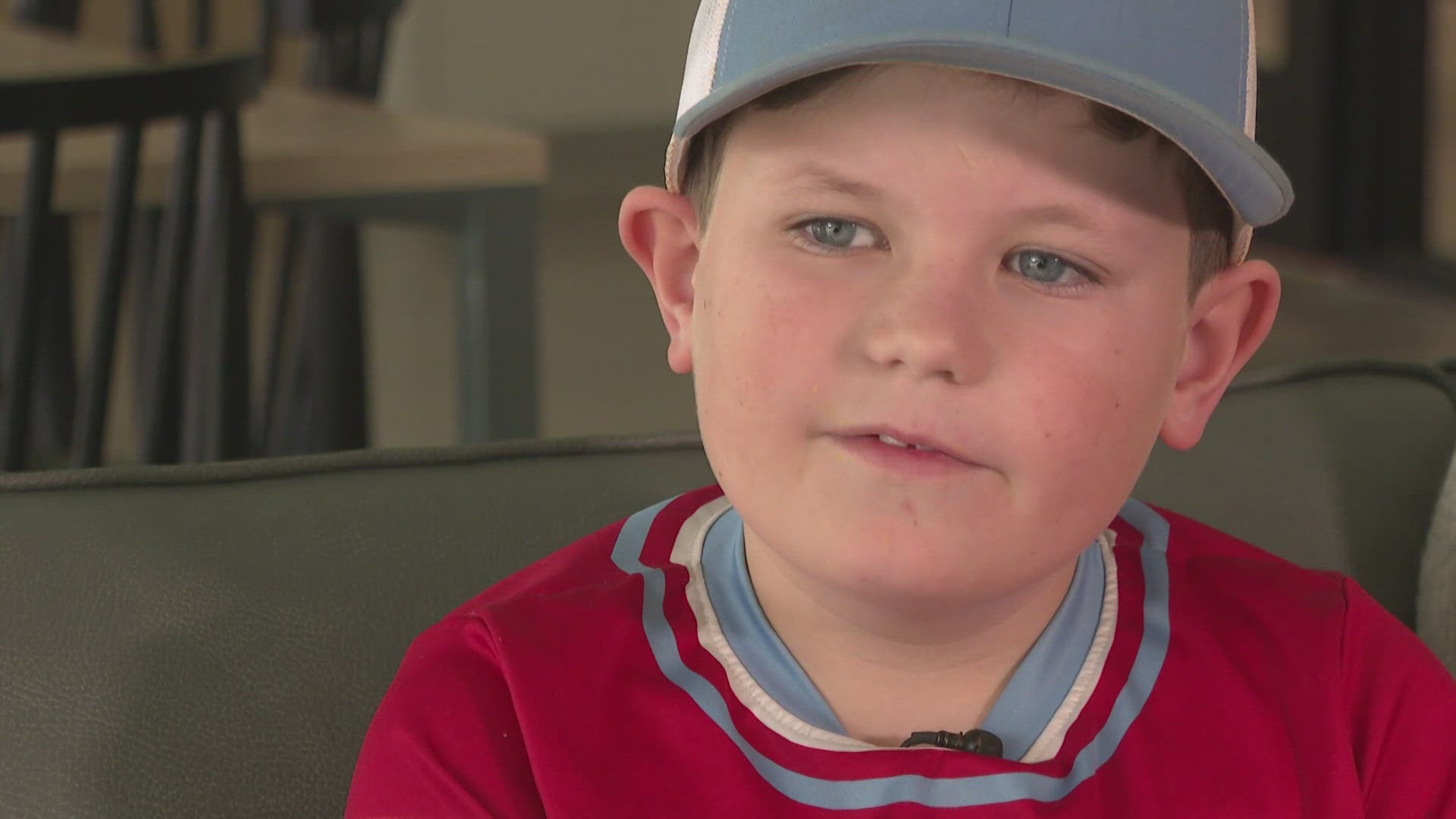 The young boy is trying to make an impact one bag of candy at a time.